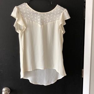 Off white blouse with lace neckline